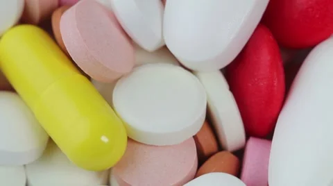 Pills rotate on white background. closeup Stock Footage 8657779