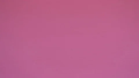 Pills scattered on a pink background. Видео 126556175