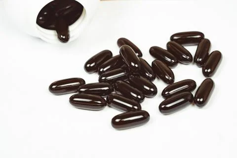 Pills scattered on the table Stock Photos