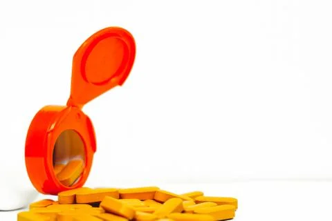 Pills scattered on the table Stock Photos