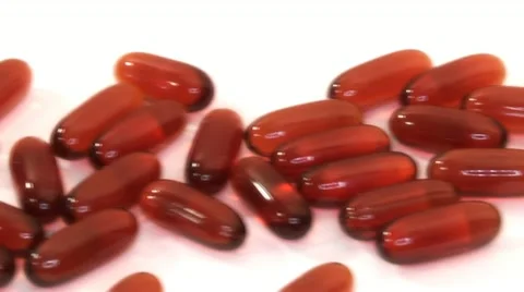 Pills scattered on a white background Video stock 14824891