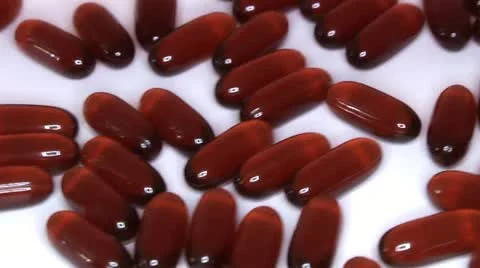 Pills scattered on a white background Video stock 14825447