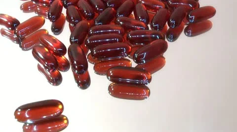 Pills scattered on a white background Stock Footage 14825468