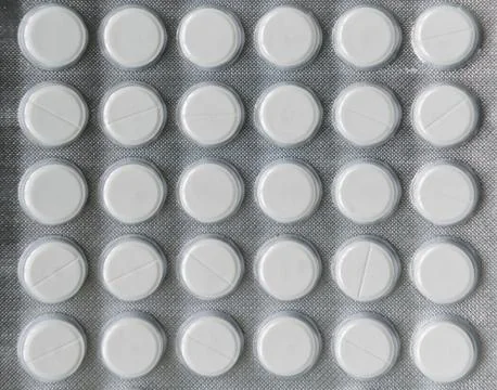 Pills in a silver wrapper. Medication background texture. health pharmaceutics Stock Photos