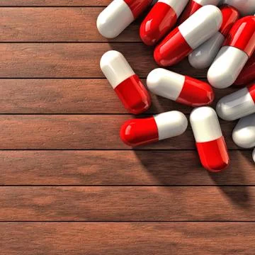 Pills on table Stock Photos