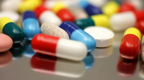 Pills, tablets and capsules rotate. Stock Footage