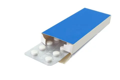 Pills tablets in open package on white background Stock Photos