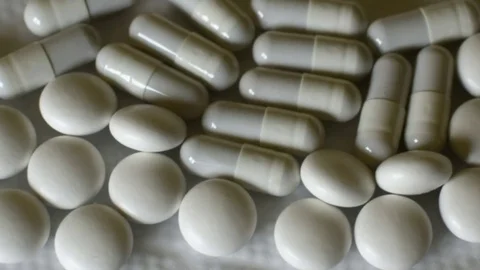 Pills tabs close up Stock Footage 75187406