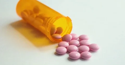 Pills turning in a seamless loop. Rotating circular drug. Pill bottle spilling Stock Footage 78533131