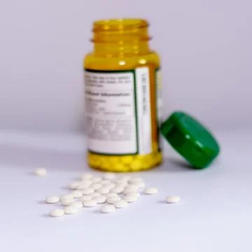 Pills with vertical bottle Stock Photos