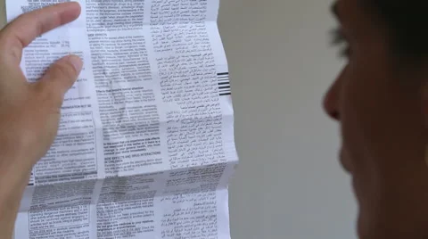 Pills warnings page Stock Footage 52441144