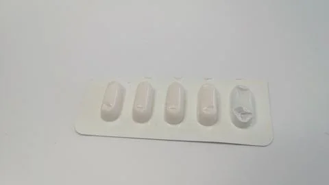 Pills on a white background. Stock Photos