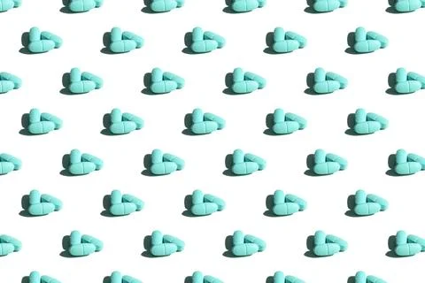 Pills on a white background. pill pattern. Hard shadows Stock Photos