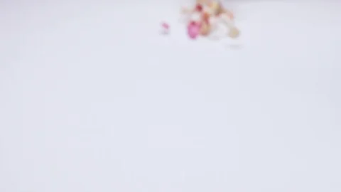  Pills on white background in slow motion Stock Footage 103466393