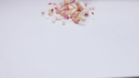  Pills on white background in slow motion Stock Footage 103466405