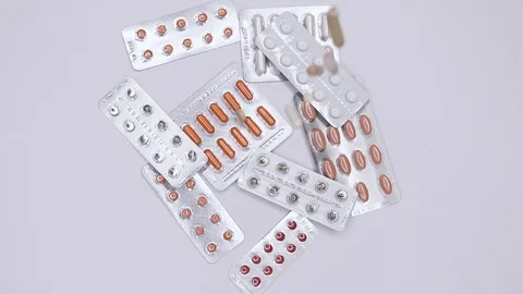  Pills on white background in slow motion Stock Footage 103466523