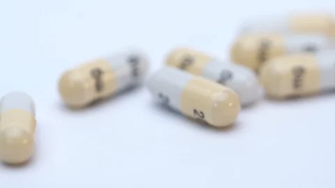 Pills on withe background close up slider Stock Footage 127761451