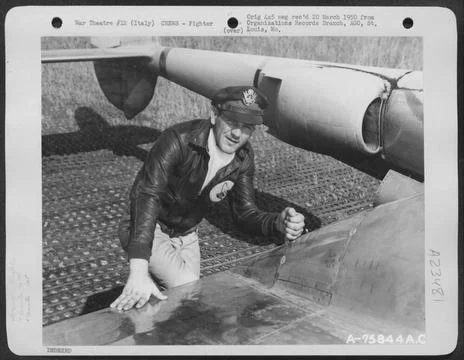 A Pilot Of The 94Th Fighter Squadron, 1St Fighter Group, Poses By His Lock... Stock Photos