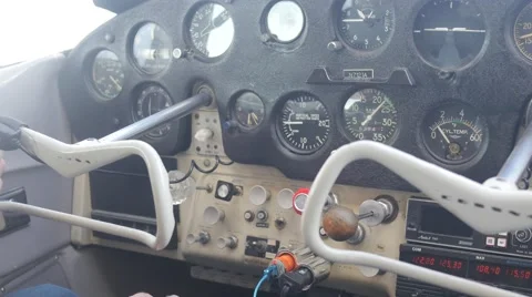 Pilot adjust knobs during flight Stock Footage 48981583