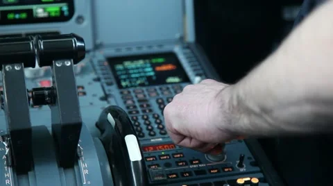 Pilot adjusting instruments Stock Footage 22034734