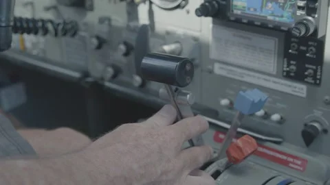 Pilot Adjusting Throttle and Levers in Aircraft Cockpit, Sydney Region Stock Footage 345730946