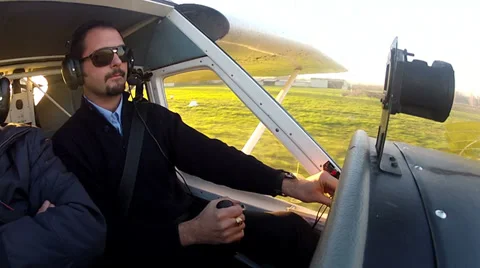 Pilot on airplane taking off Stock Footage 32212849