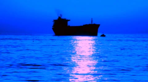 Pilot and a cargo ship in the night sea Stock Footage 30719614