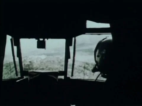 A pilot and crew of the 228th Assault Support Battalion transport equipment and Stock Footage