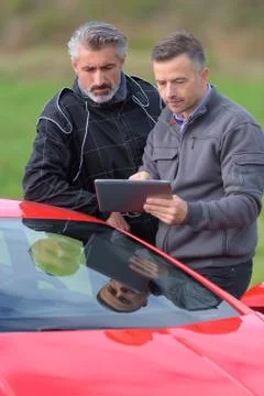 Pilot and engineer reviewing performance during speed tests Stock Photos