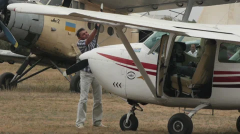 Pilot attempts to start the engine rotating the nosewheel Stock Footage 38392894