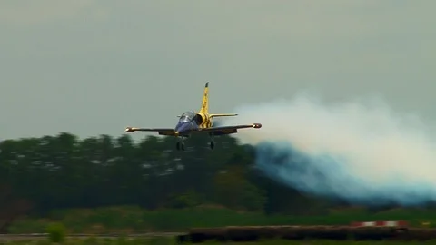 Pilot of Baltic Bees team on L-39 plane performs maneuver - drunken pilot. Stock Footage 106370295