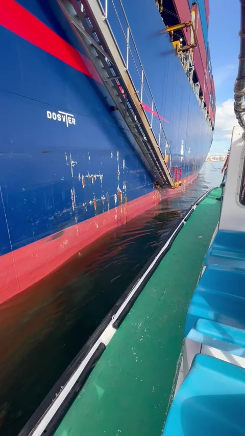 Pilot boat alonside Video stock 321364732