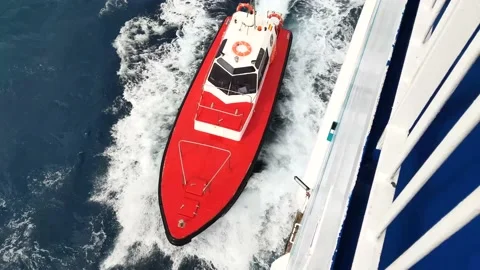 Pilot boat approaching a ship, ship captain comes on board. 動画素材 171588867