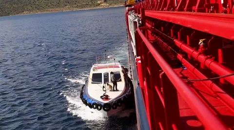 Pilot boat going with ship port Thisvi March 2016 Video stock 68037960