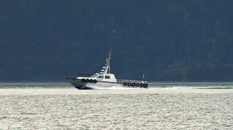 Pilot Boat Heading Back into Harbor by Forest Stock Footage 11780776