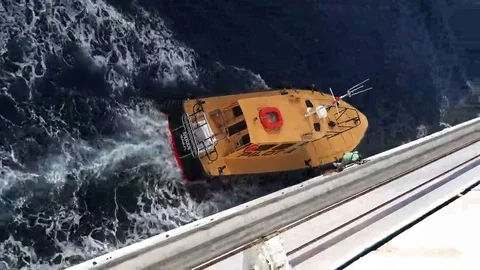 Pilot boat retrieving pilot 4K Stock Footage 69206485