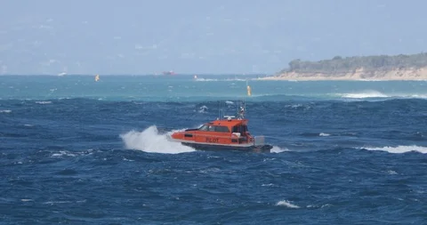 Pilot boat returning to Port Philip bay after escorting a cargo ship out to sea. Stock Footage 99074202
