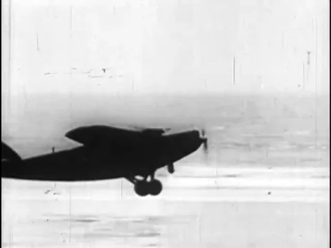 Pilot Charles Lindbergh prepares to fly the Spirit of St. Louis aircraft on a Stock Footage 74936157