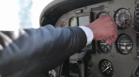 Pilot checking controls on small plane with single engine prop Stock Footage 45890095