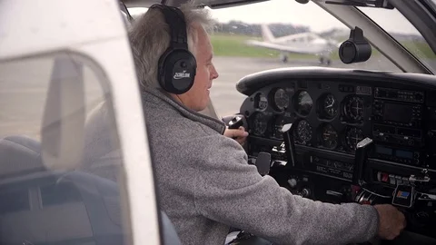 Pilot Checking Instruments and Settings Before Airplane Takeoff Stock Footage 99267863