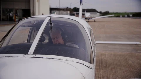 Pilot Checking Instruments and Settings Before Airplane Takeoff Stock Footage 99267894