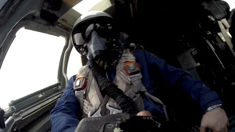 The pilot checks the control knob Stock Footage 113506054