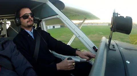 Pilot in the cockpit of airplane Stock Footage 32213021