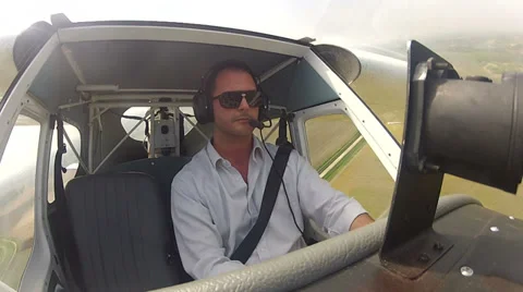 Pilot in the cockpit of airplane Stock Footage 32617531