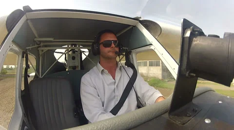 Pilot in the cockpit of airplane Stock Footage 32618092