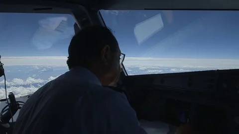 Pilot in cockpit during flight Video stock 77049049