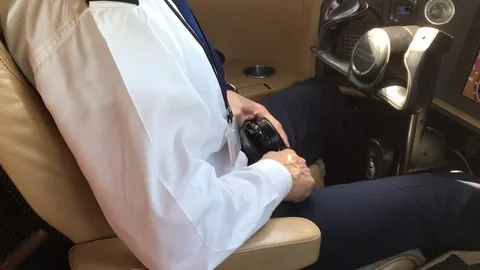 Pilot in cockpit getting ready for the flight 動画素材 84888194