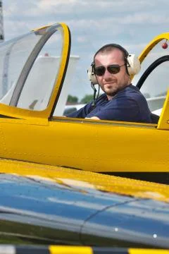 Pilot in the cockpit Stock Photos