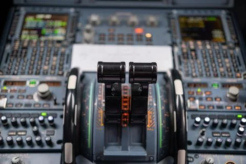 Pilot in command setting control panel in cockpit Stock-Fotos