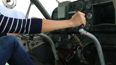 Pilot controlling helm in the cockpit Stock Footage 89147559